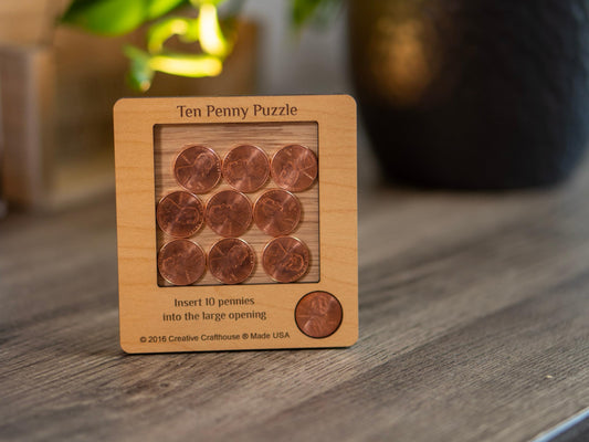 Creative Crafthouse wooden brain teaser closeup shows laser engraving detail.