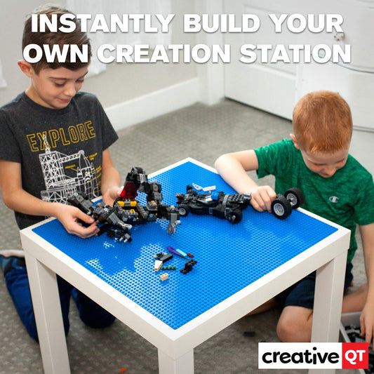 Creative QT adhesive baseplate on wall in blue close-up for easy mounting.
