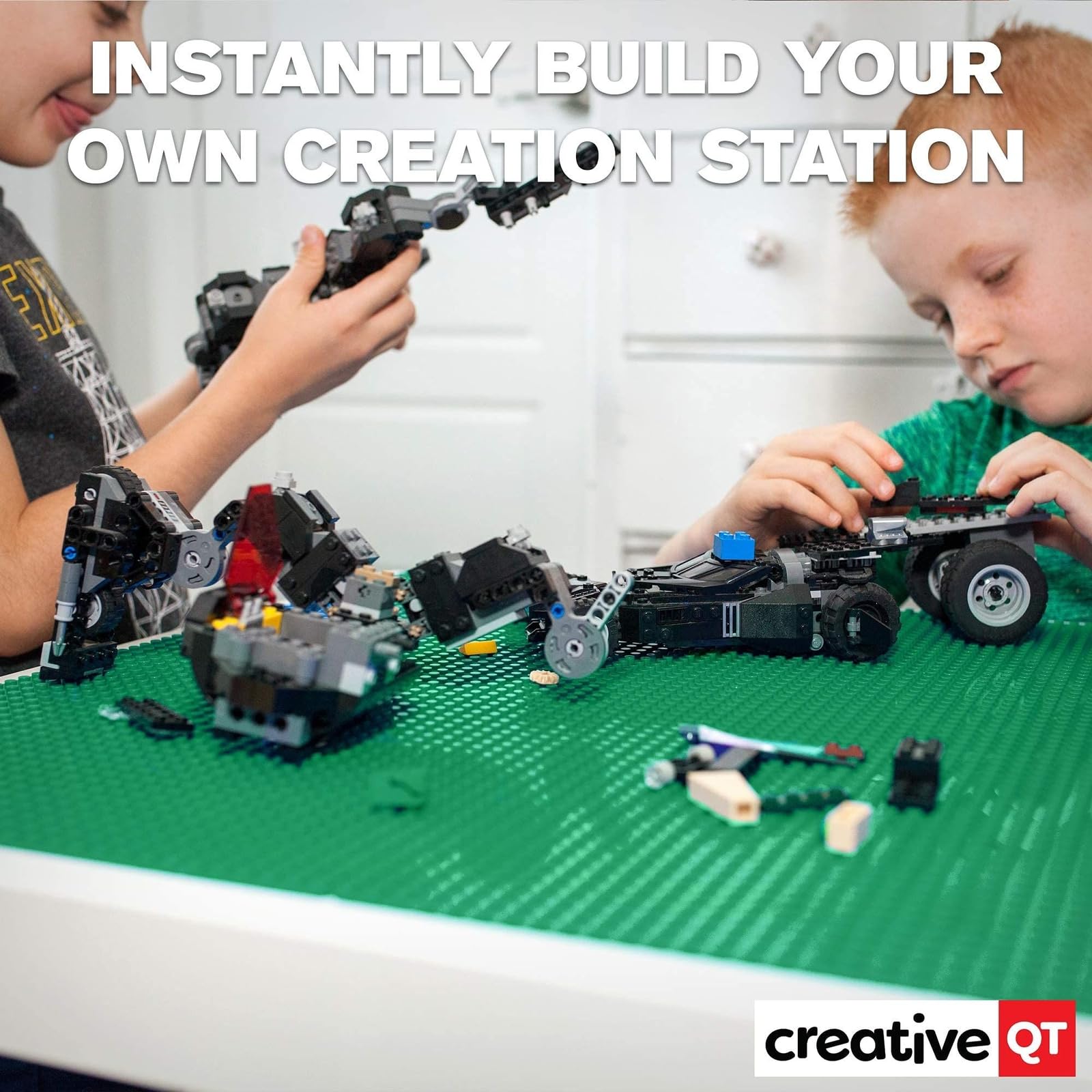 Creative QT baseplates on table providing instant play space for kids.