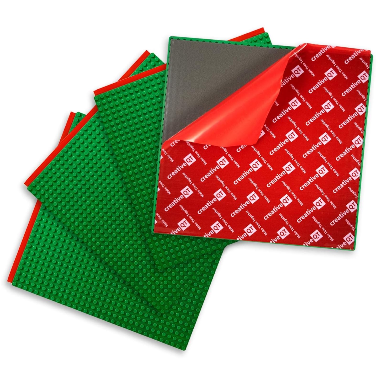 Creative QT baseplates green 4-pack mounted on wall for mess-free building fun.