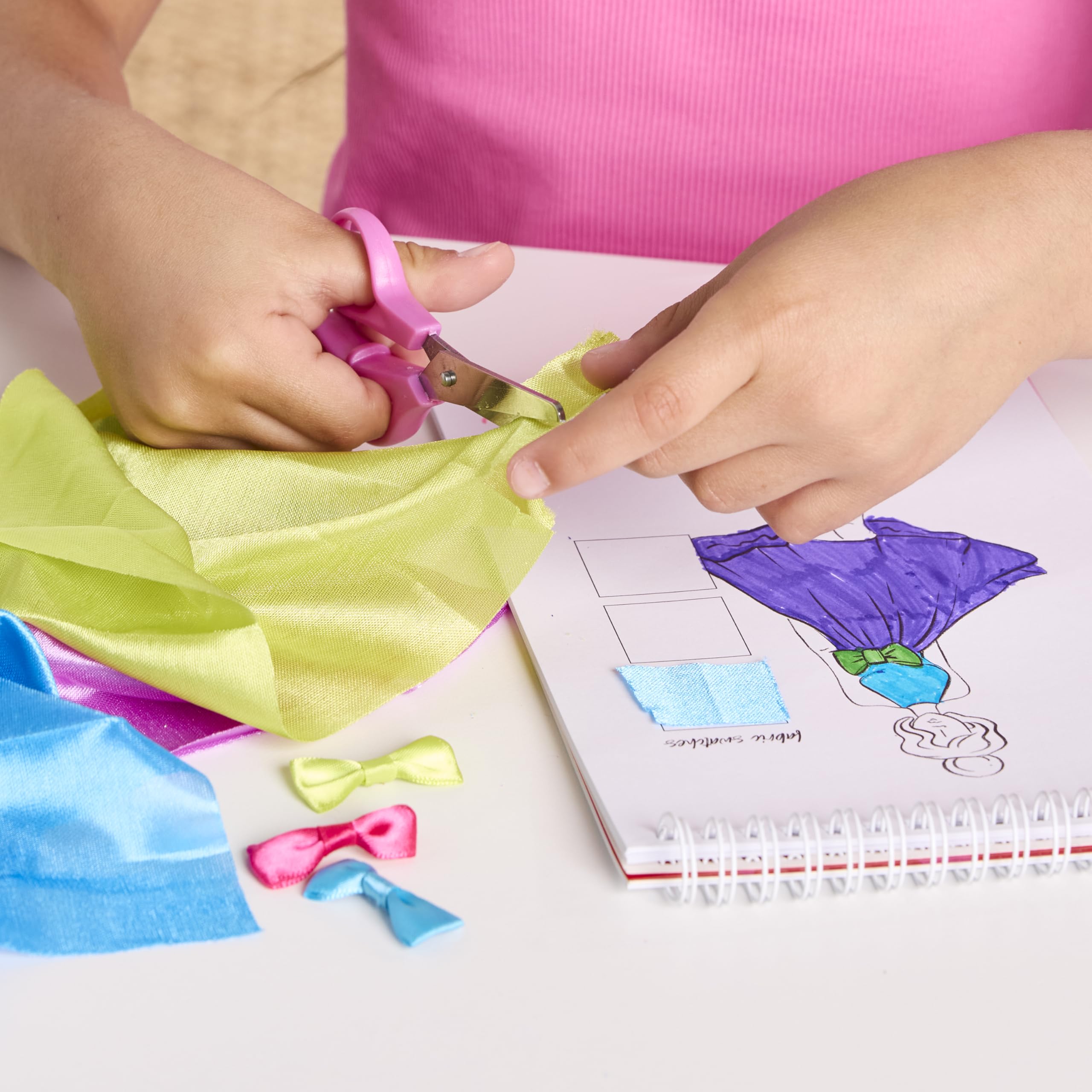 Creativity for Kids Design by You Fashion Studio design manual provides step by step guidance for budding designers.
