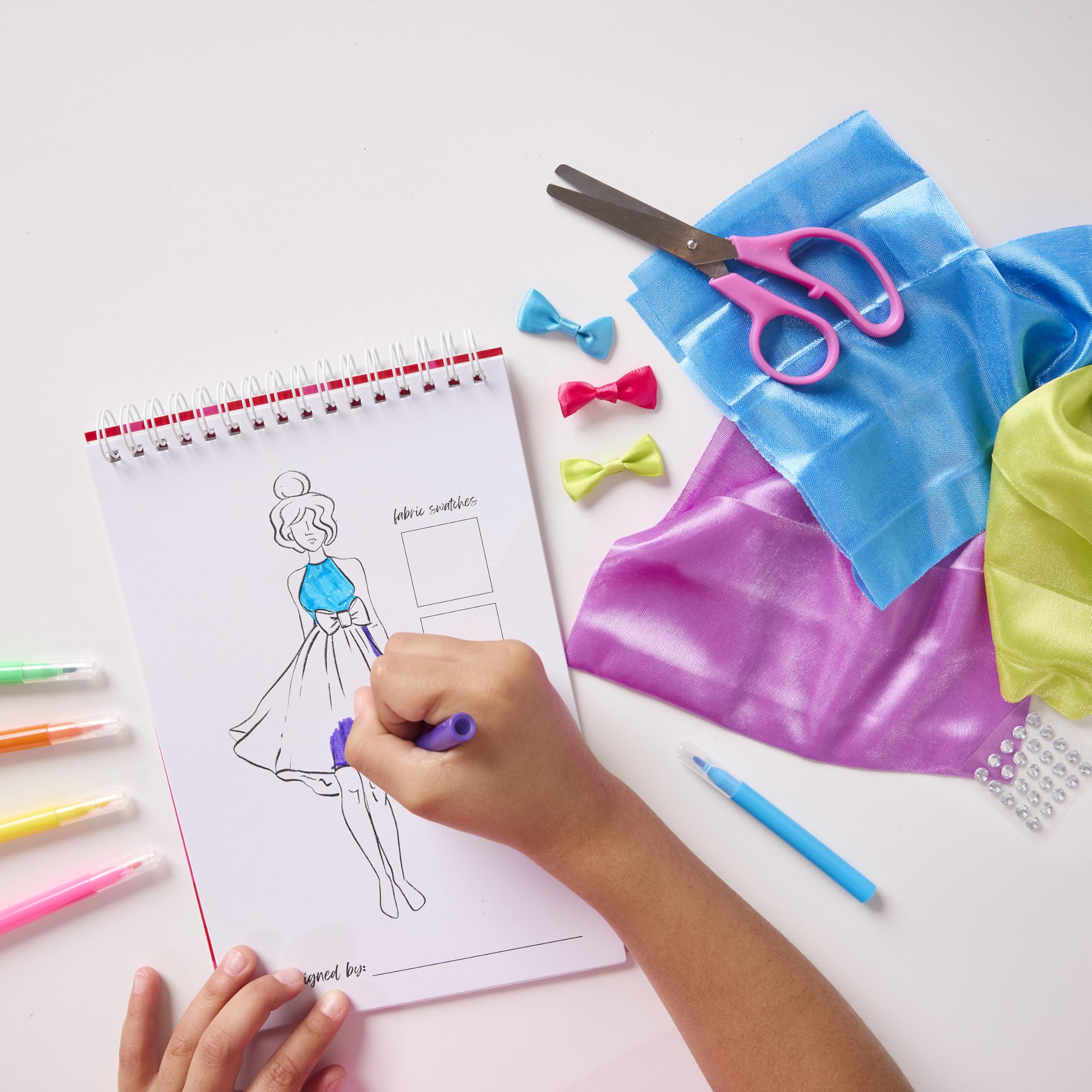 Creativity for Kids Design by You Fashion Studio garment bag protects and displays finished pieces.