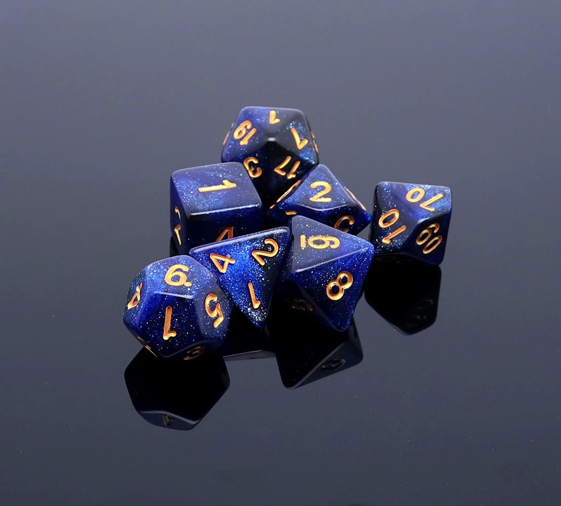 Close-up of blue nebula dice showing clear gold pips for quick readability.