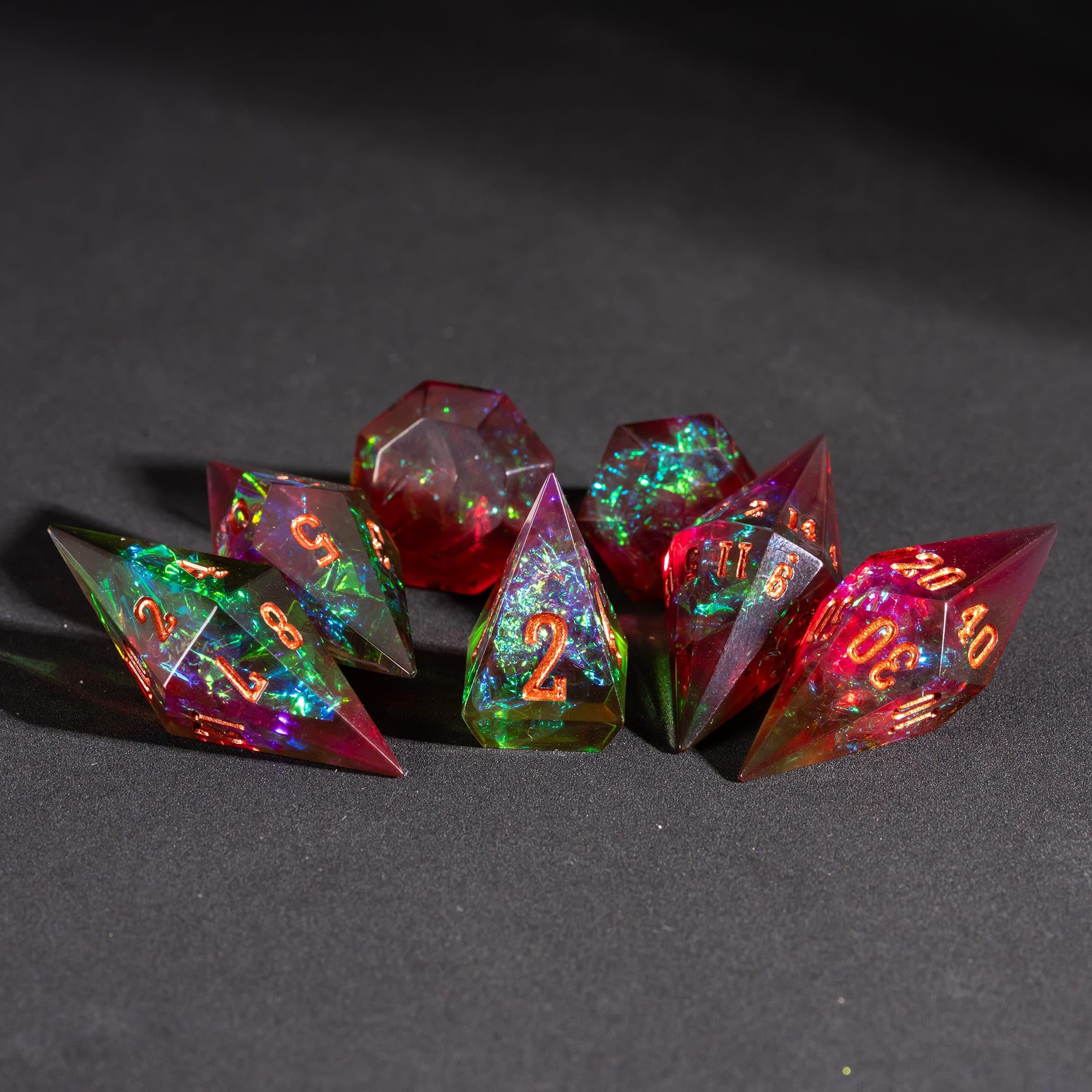 CRITALLIC faceted-dice reflect light for an eye-catching gaming centerpiece.