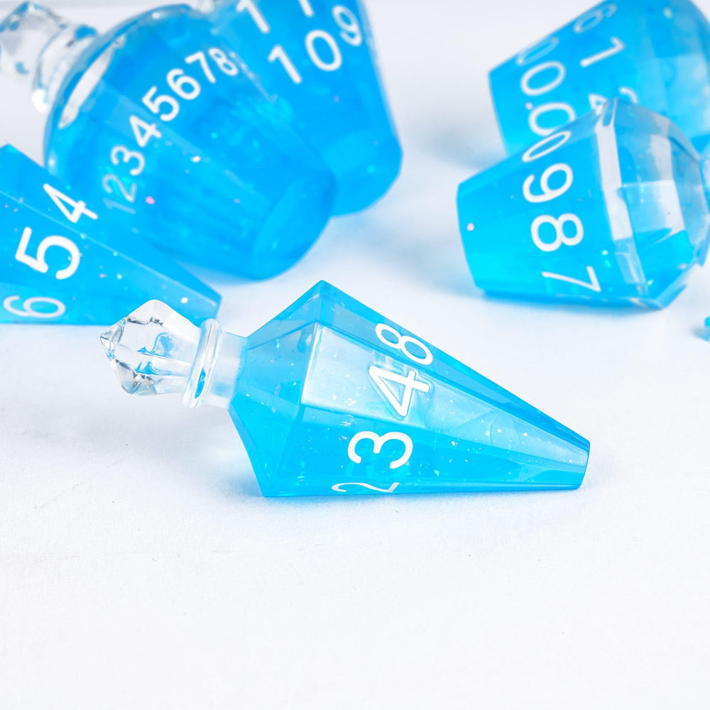 CRITALLIC potion dice blue bottle-2 highlights the translucent cap for striking display during play.
