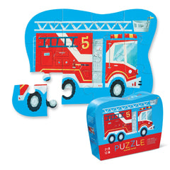Crocodile Creek Fire Truck 12-piece puzzle on the floor promotes early hand-eye coordination.