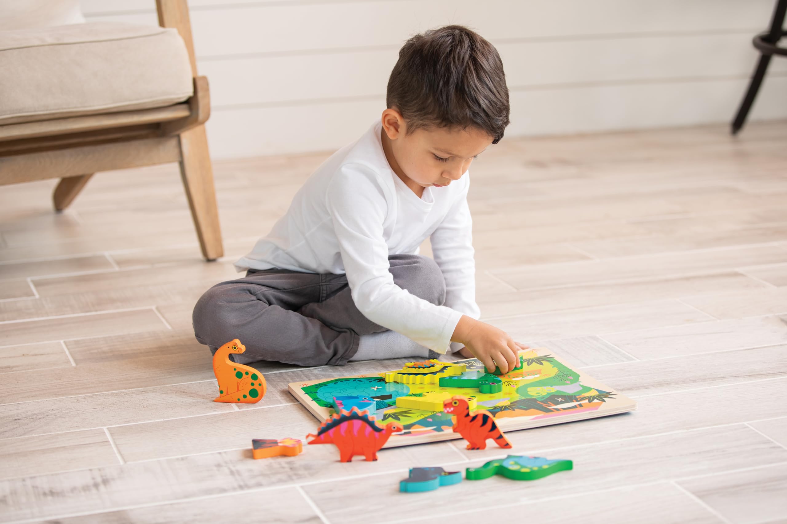 Crocodile Creek educational activity promotes fine motor skills during family time.