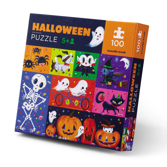 Crocodile Creek Halloween 100-piece floor puzzle laid out for kids five and up, fostering focused play.