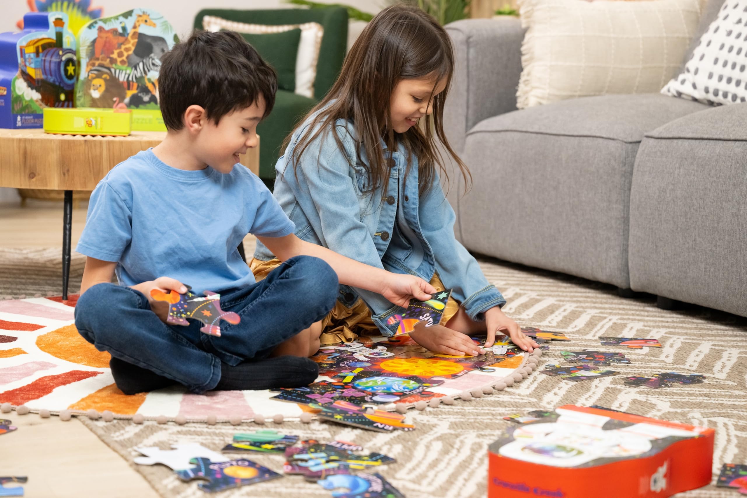 Crocodile Creek kids enjoy a collaborative floor puzzle session.