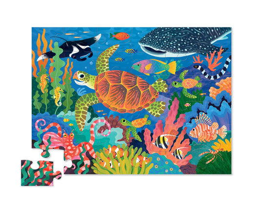 Crocodile Creek kids hands assembling: puzzle play helps refine fine motor skills.
