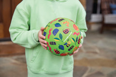 Crocodile Creek ball with bright colors for engaging indoor and outdoor play.