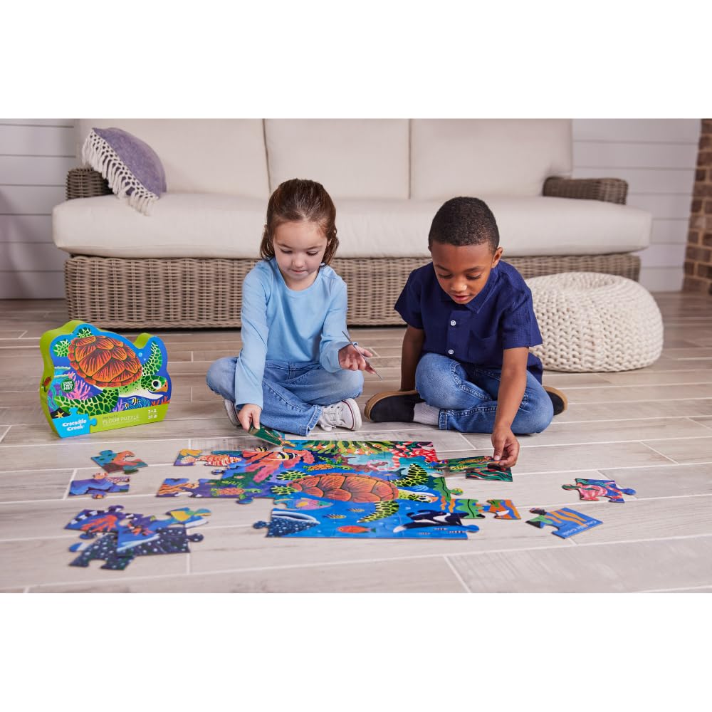 Crocodile Creek puzzle box storage keeps pieces tidy and portable.