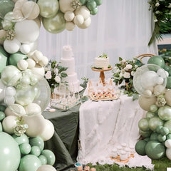 CROSSFINGERS double-stuffed balloons in sage-green provide durable, vibrant color for weddings.