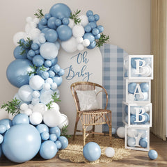 CROSSFINGERS dusty blue balloon arch kit creates a stunning baby shower backdrop with easy setup.