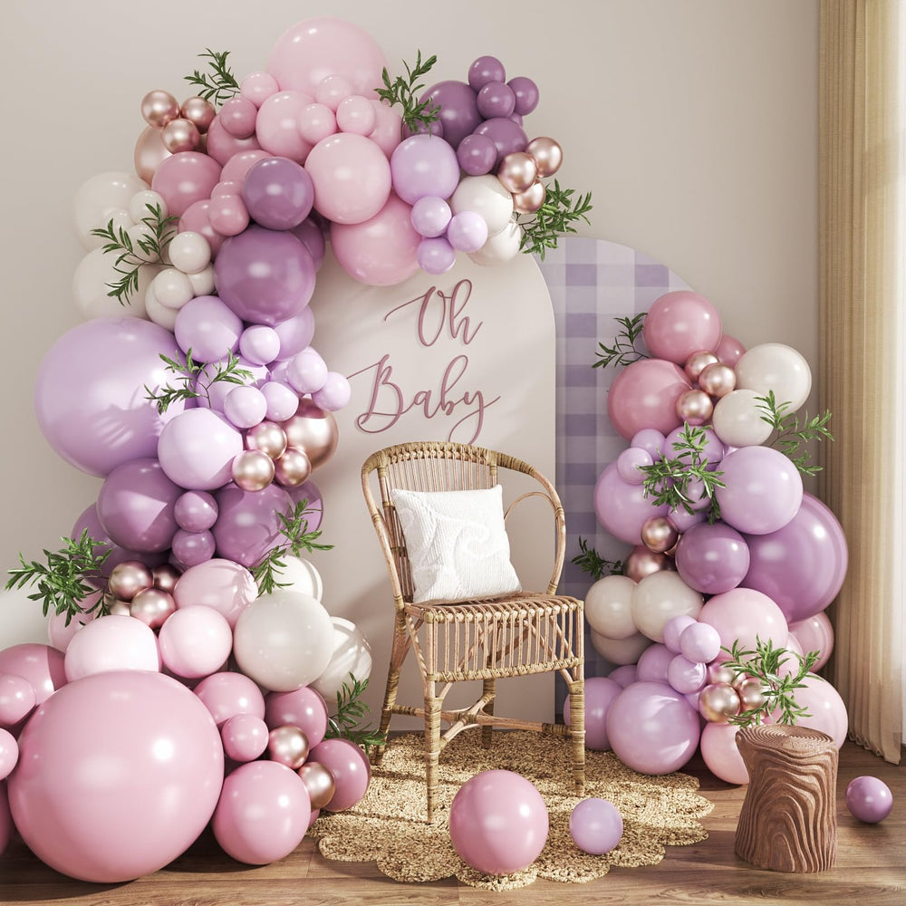 CROSSFINGERS dusty purple balloon arch kit assembled for an elegant event.