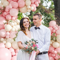 CROSSFINGERS pink and white balloon assortment highlighting the color palette for events.