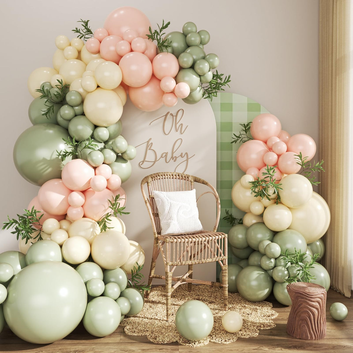 Crossfingers sage-green balloon arch kit assembly for a chic event backdrop.