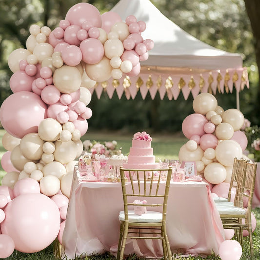 CROSSFINGERS sand-white balloons provide soft contrast for chic celebrations