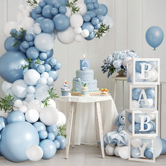 CROSSFINGERS white and dusty blue balloons add clean accents for gender reveals or birthdays.