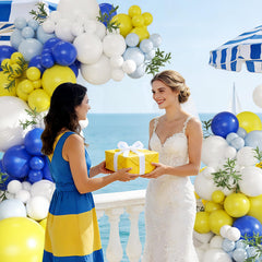 CROSSFINGERS white accent balloons balance the arch design