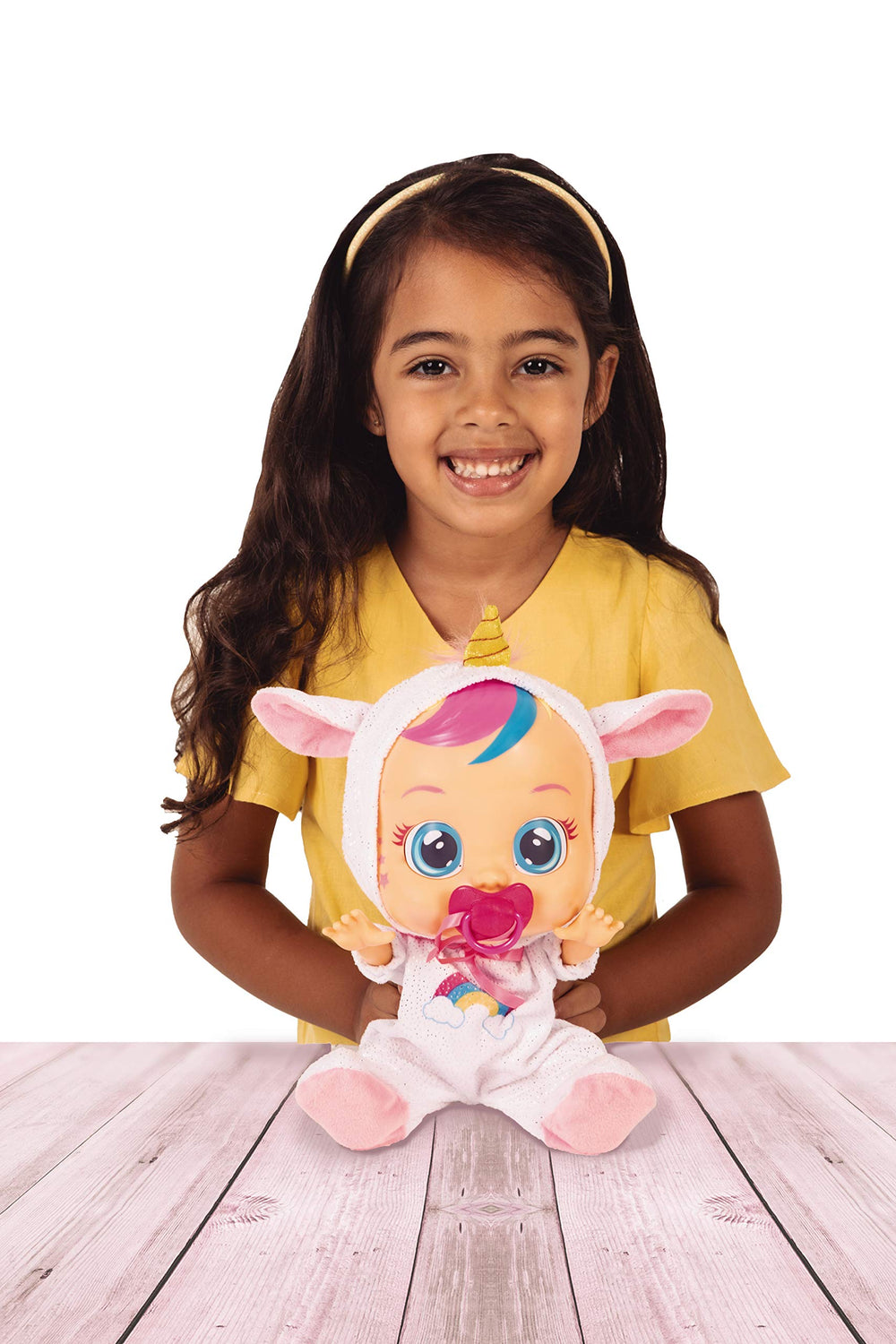 Cry Babies Dreamy Unicorn doll interchangeable onesie enables outfit variety