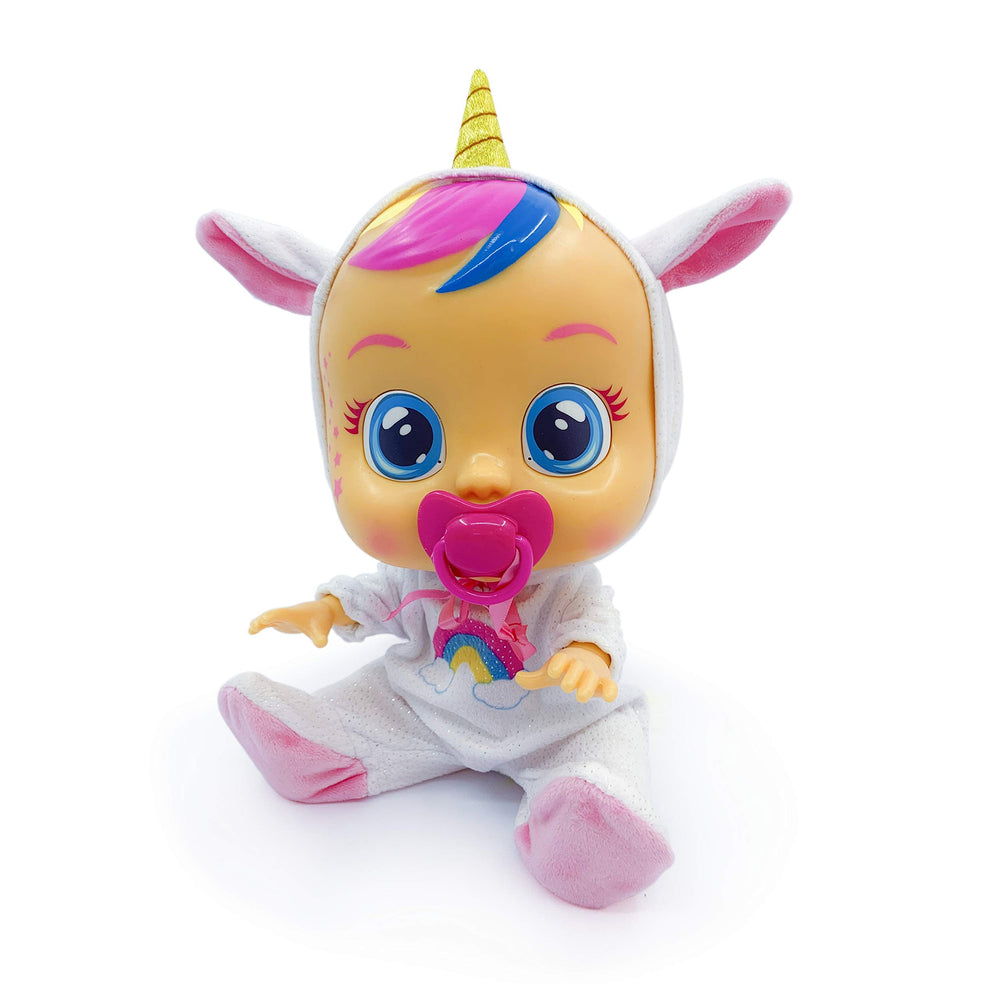 Cry Babies Dreamy Unicorn doll pacifier in mouth for soothing play