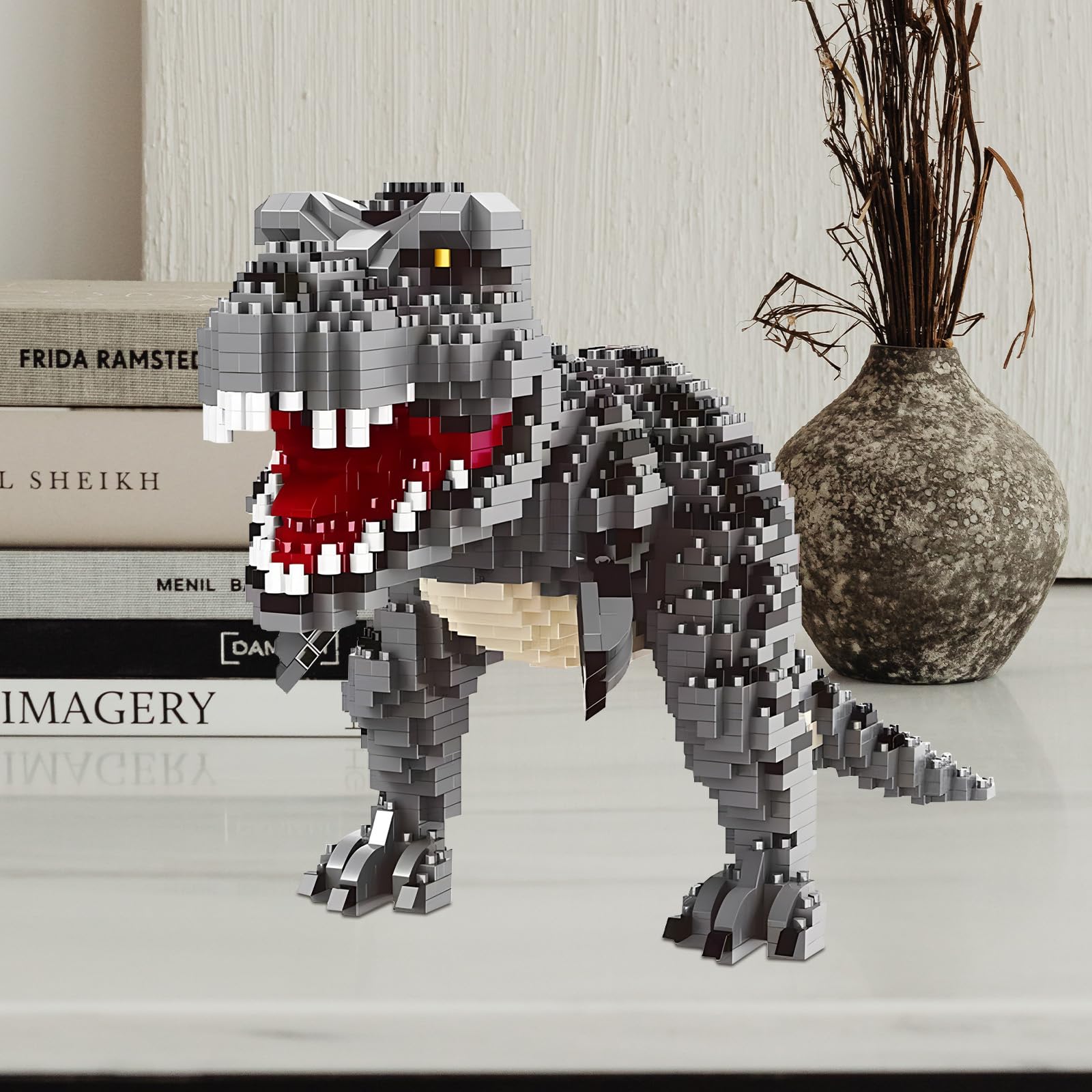 CSNRHG Tyrannosaurus model in hand illustrating scale for tabletop display