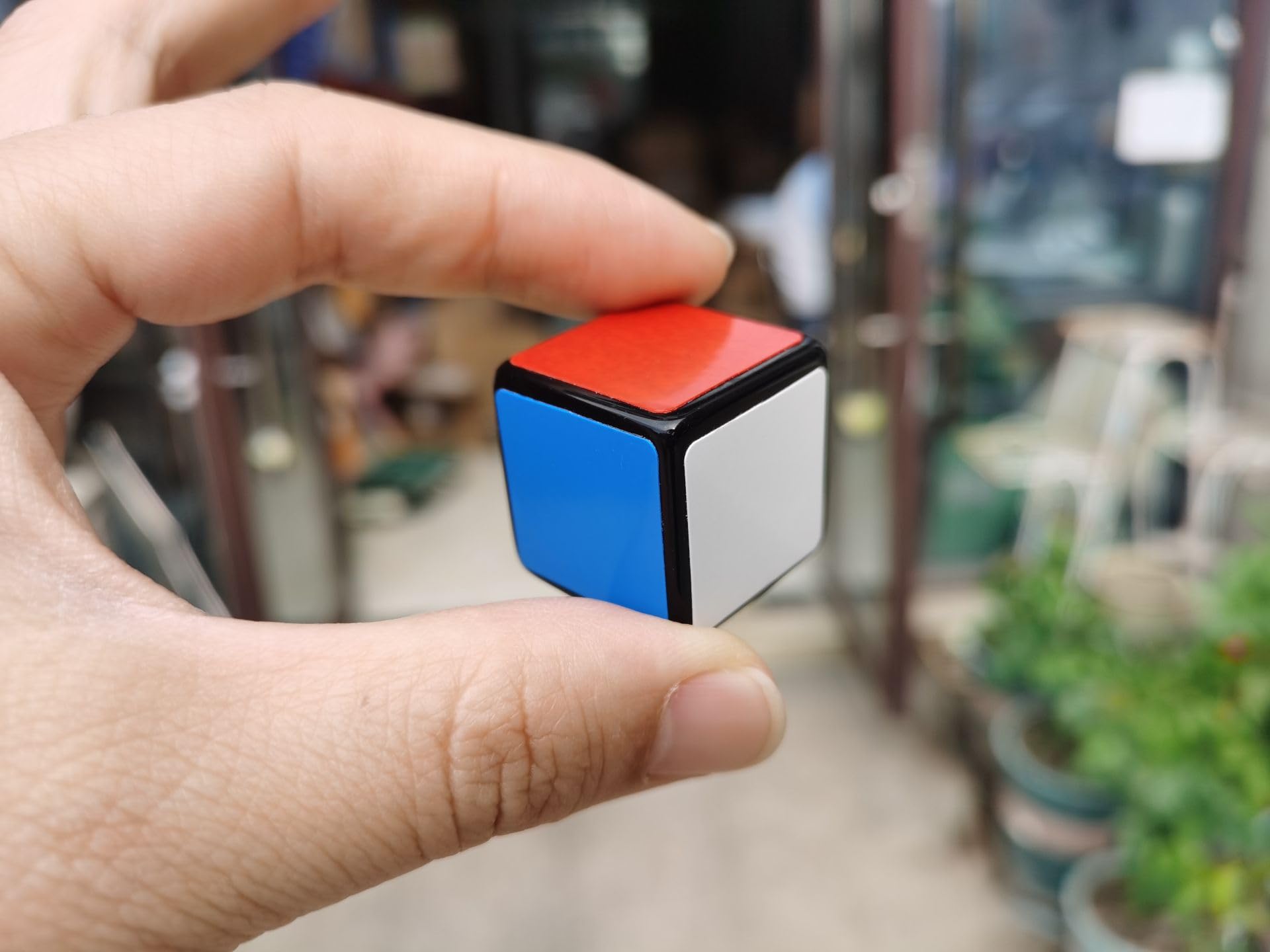Cuberspeed 1x1x1 speed cube rotating to show fluid motion for speedcubing practice.