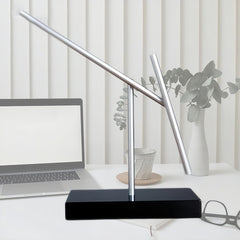 CulinaryEdge kinetic energy pendulum in office environment enhances subtle ambiance.