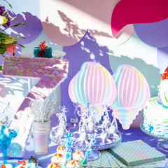 Cunhill Mermaid scale cups reflect color and add festive drink setup.
