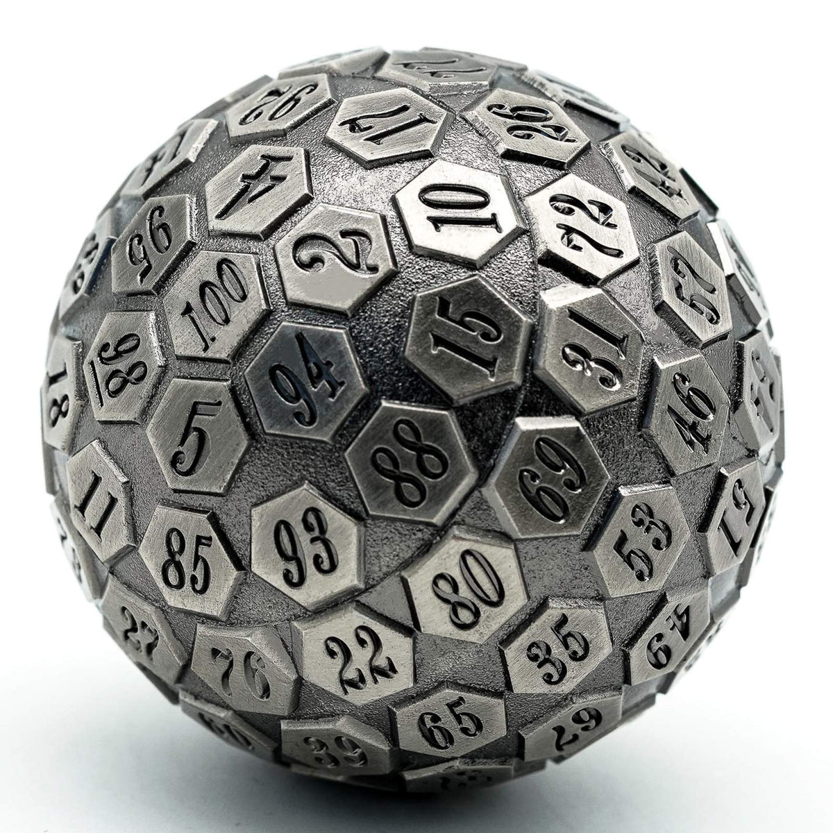 Cusdie D100 metal dice in ancient silver, close-up, highlighting the large 100 faces