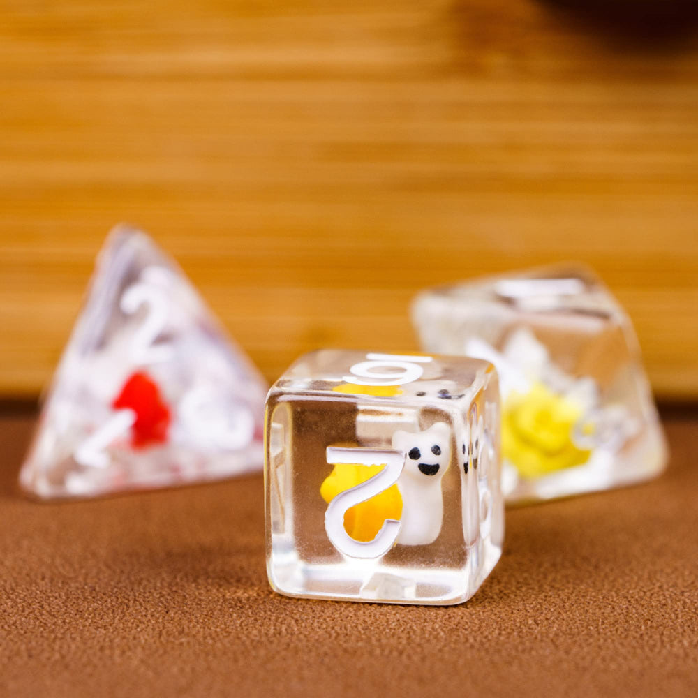 Cusdie colorful snail-filled dice set elevates game nights with collectible charm