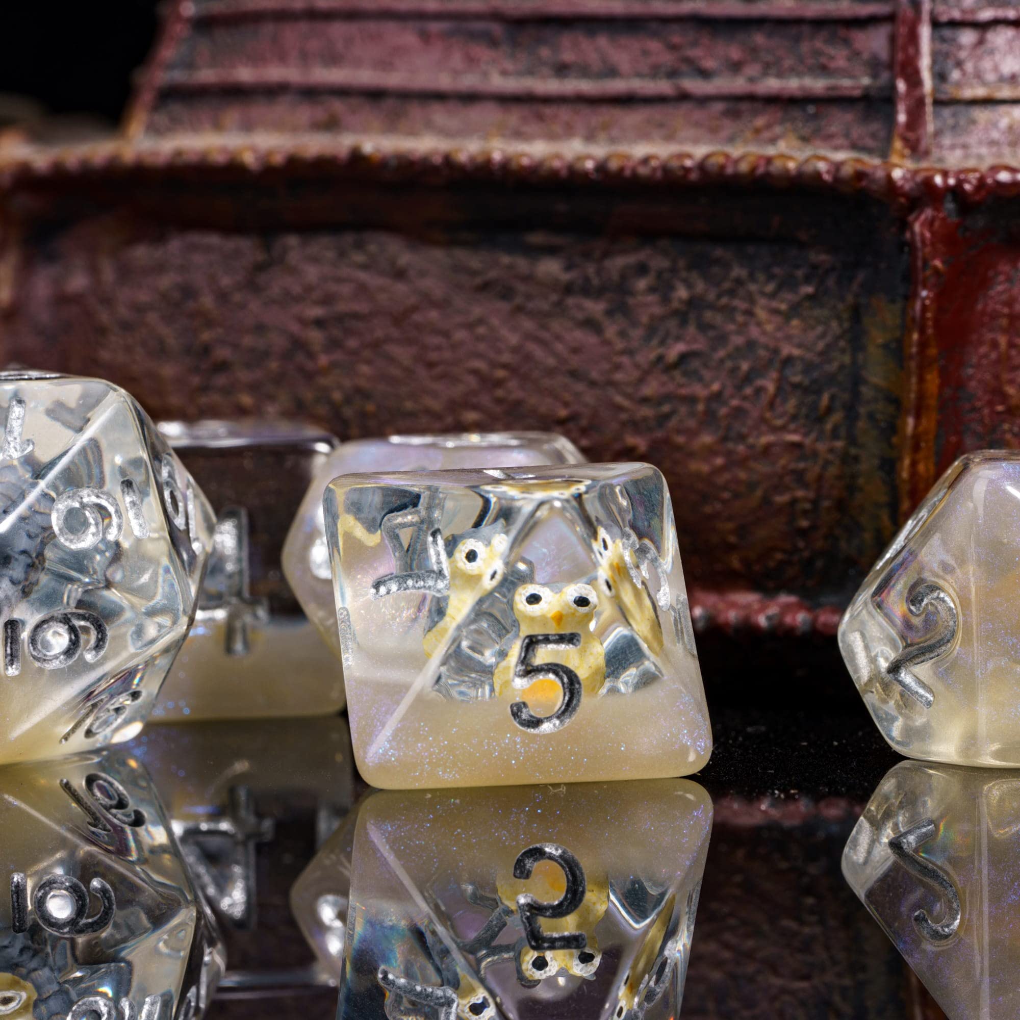 Readable silver numerals on DND dice aid quick RPG rolls.