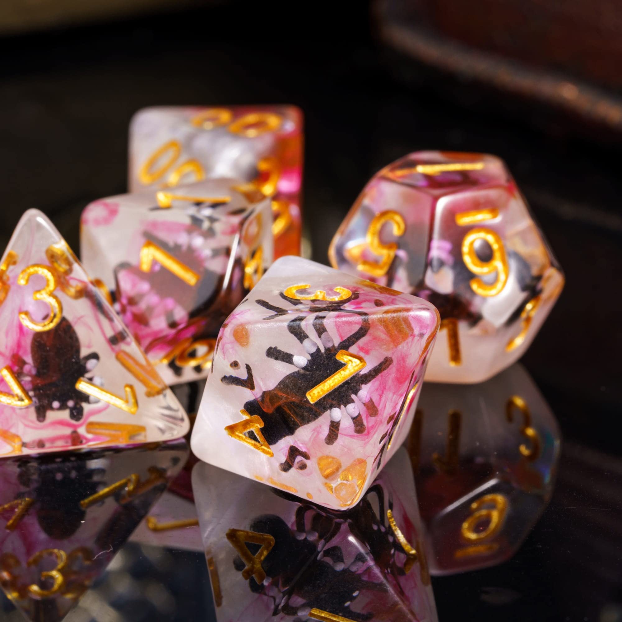 Cusdie DND dice enhance gamer setups with unique, eye-catching aesthetics.
