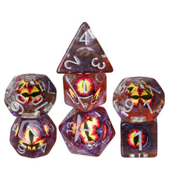 Cusdie eyeball dice arranged for group play at game night.