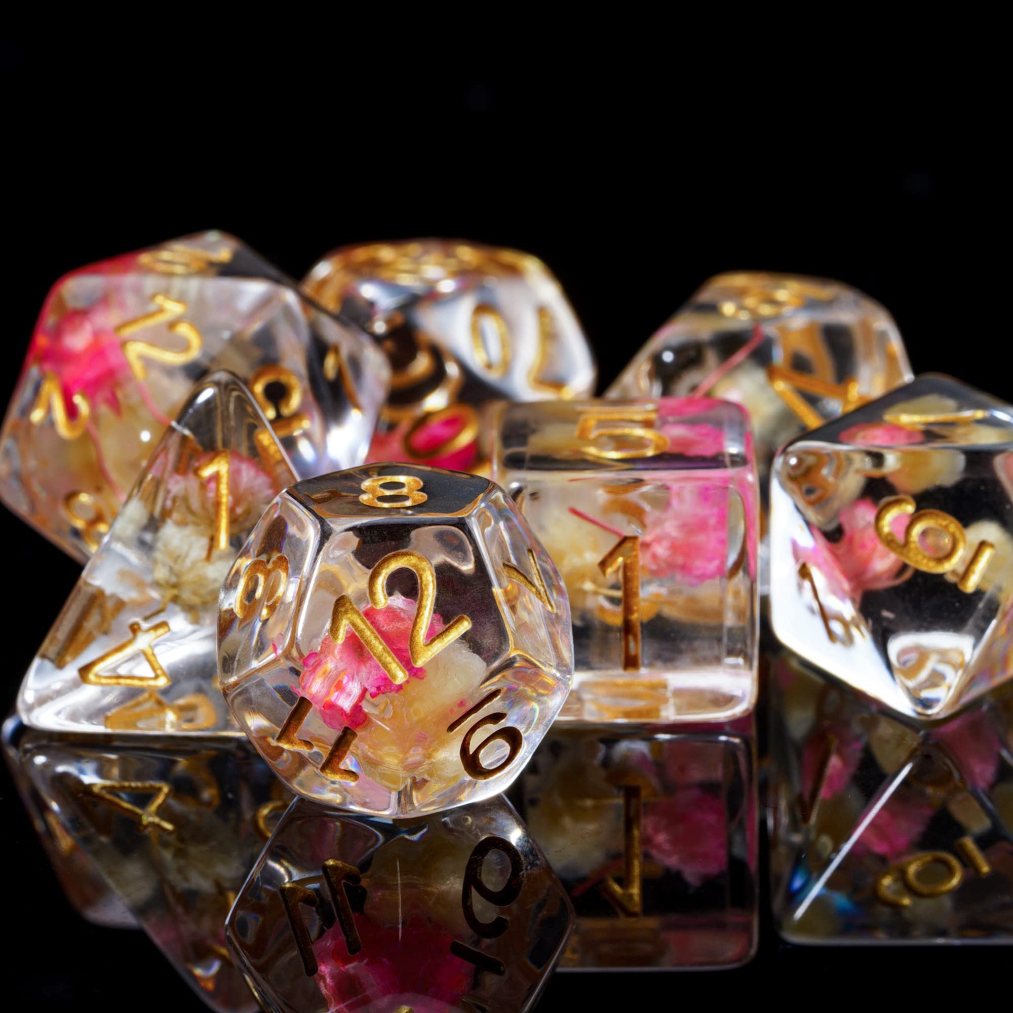 Cusdie flower-filled resin dice add vibrant table appeal during campaigns.