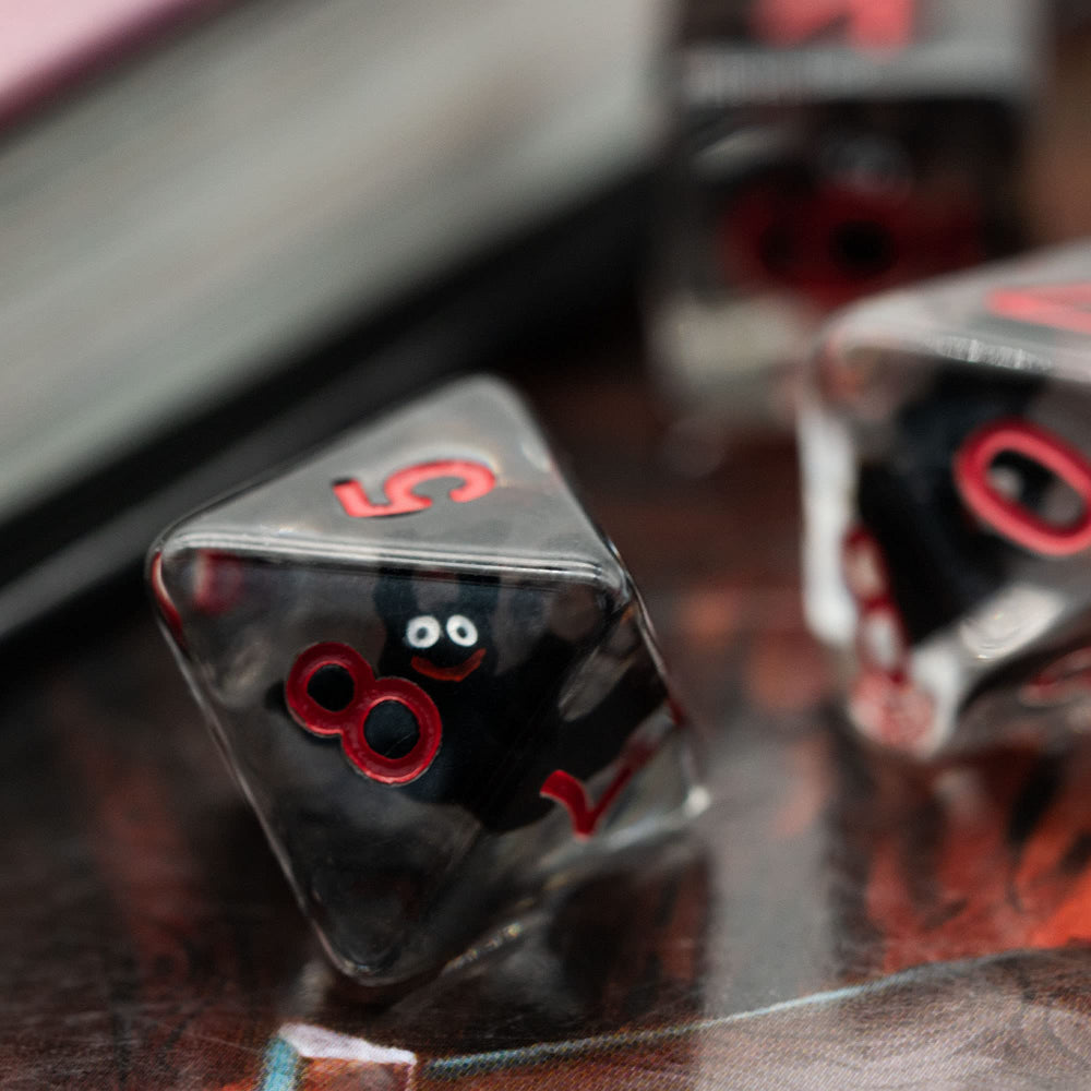 Cusdie bat-filled polyhedral dice with red numbers for easy RPG reads