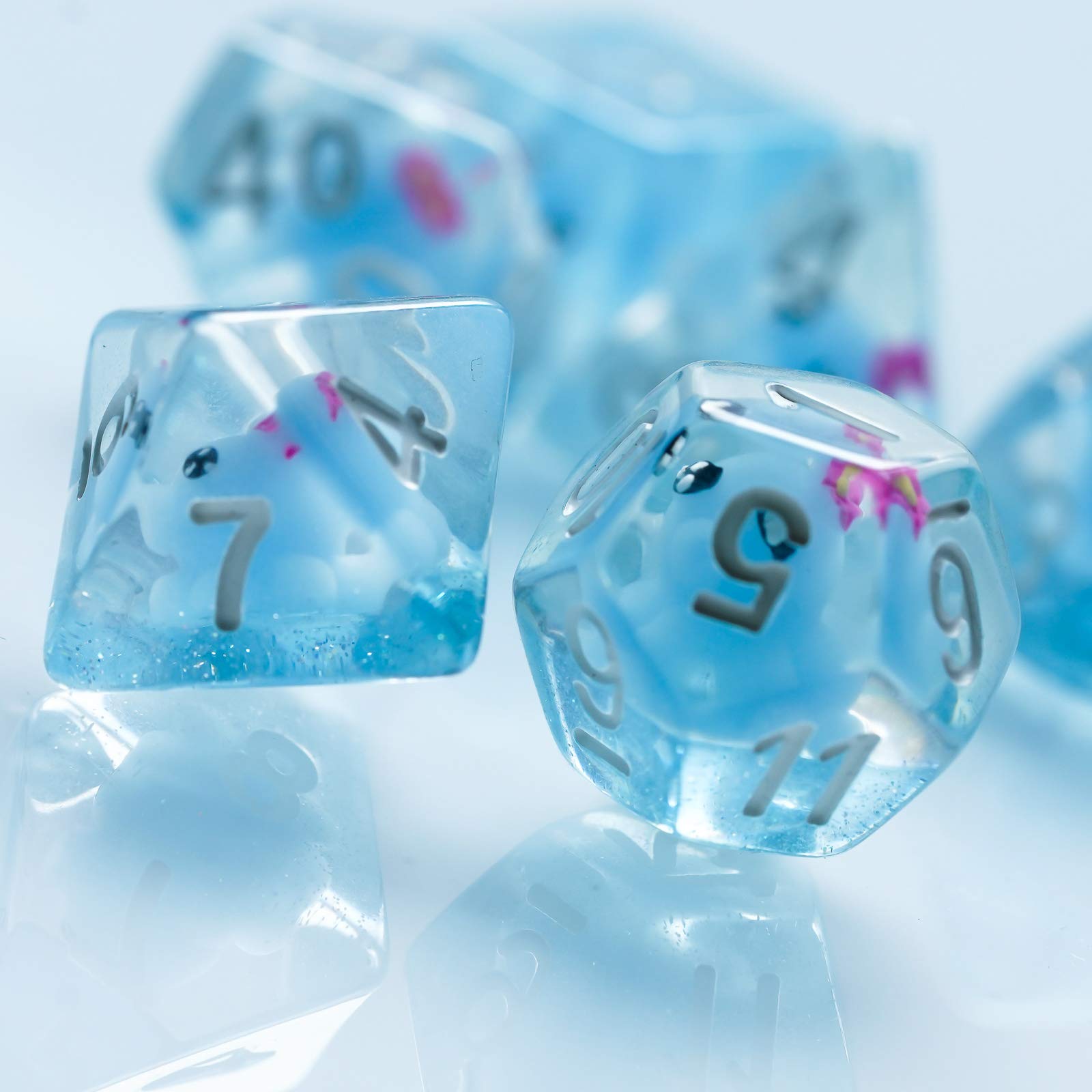 Cusdie seven-die-dnd-set highlighting polyhedral variety for diverse game scenarios.