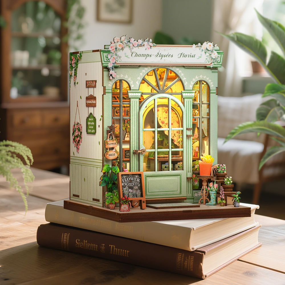 CUTEBEE Book Nook Kit decorative display on a shelf with miniatures