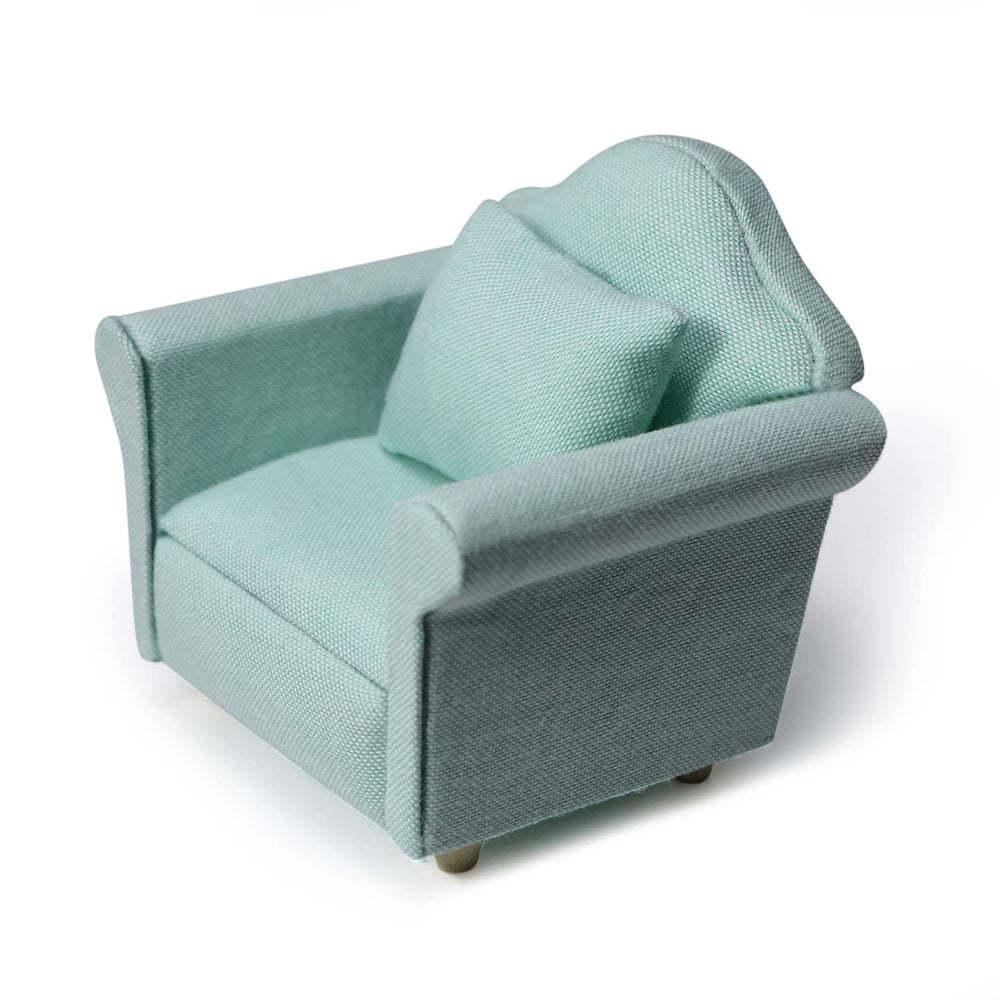Cutemini dollhouse couch with green fabric and pillow for realistic mini interiors.