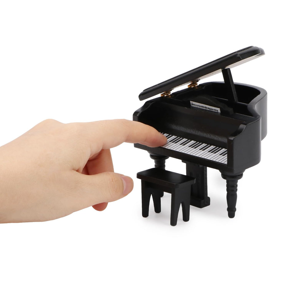 Cutemini miniature piano ornament with open lid and sheet music for dollhouse realism.