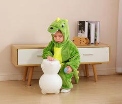 Holiday-ready CuteOn green dinosaur onesie for Halloween and Christmas.