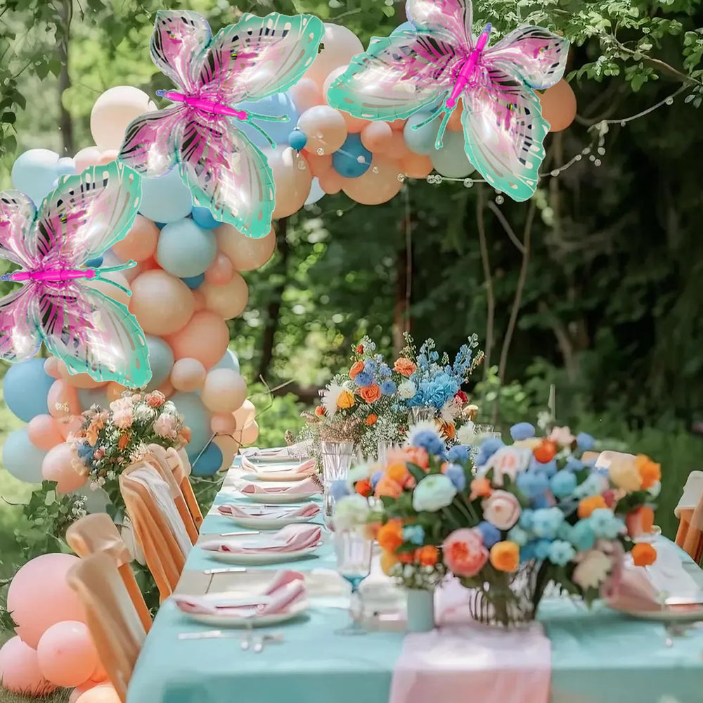 CUUSNNY butterfly foil balloons in a garden party arrangement