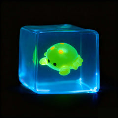 CYICTOY glow-in-the-dark crab inside the cube for playful lighting