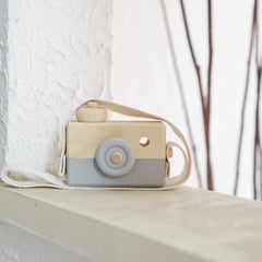 Cynzia baby camera toy room decor adds whimsy to a nursery or kid's room.