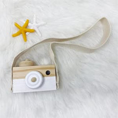 Cynzia baby room decor camera prop adds a playful photography vibe.