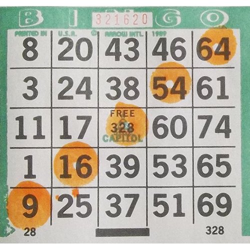 Dab-O-Ink orange bingo dauber showcases bright color for clear game marking