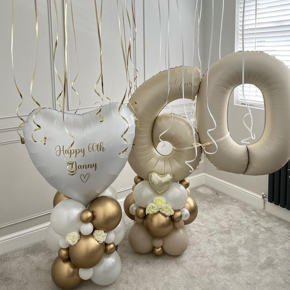 Dagelar anniversary celebrations gain standout flair with beige number balloons.
