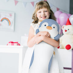 Dalmao kids bedroom penguin plush as friendly decor.