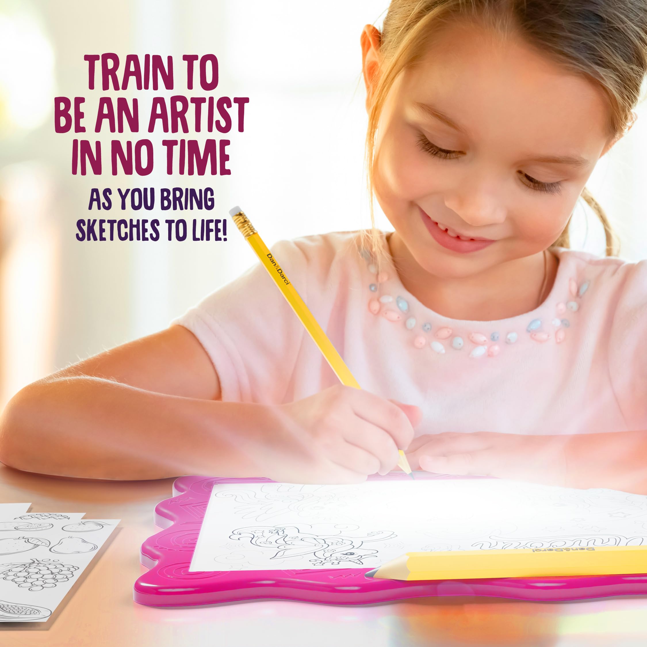 Dan&Darci child drawing session shows engaged creative play